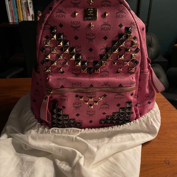 medium size pink mcm backpack